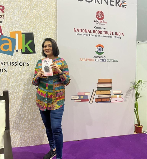 Author Rashmi Trivedi with her book She for Her at Book Fair 2023
